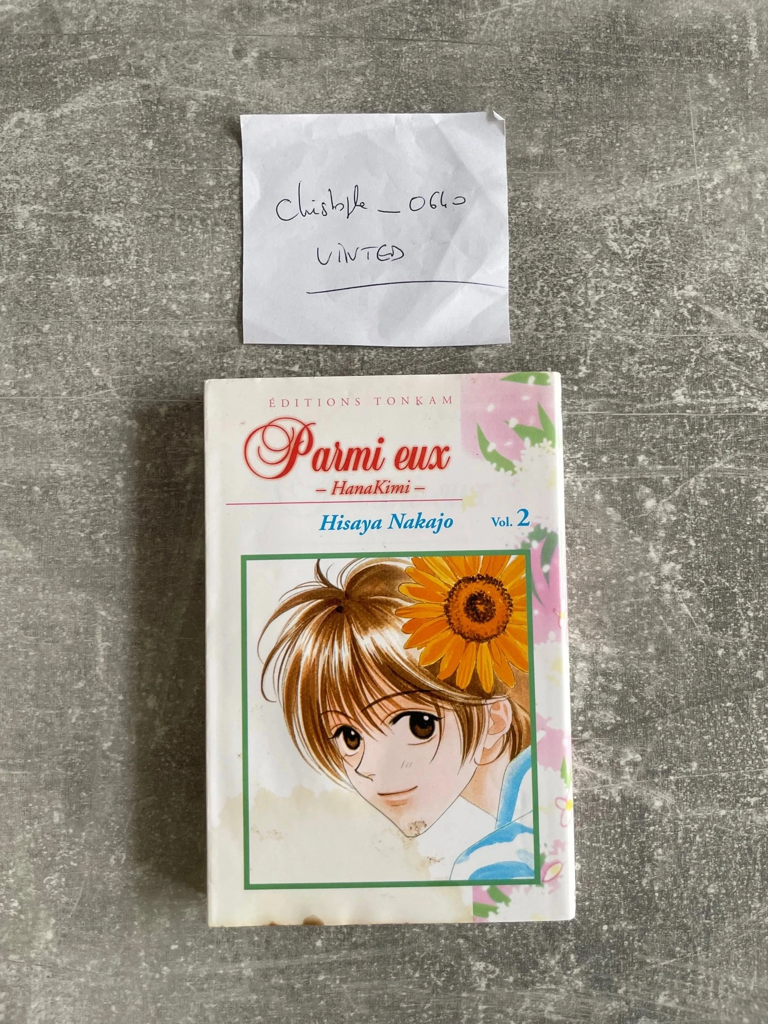 Manga Parmi eux tome 2 version française.